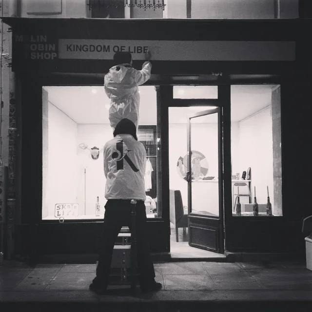 Kamel Gondry and I working on the outdoor signage.
