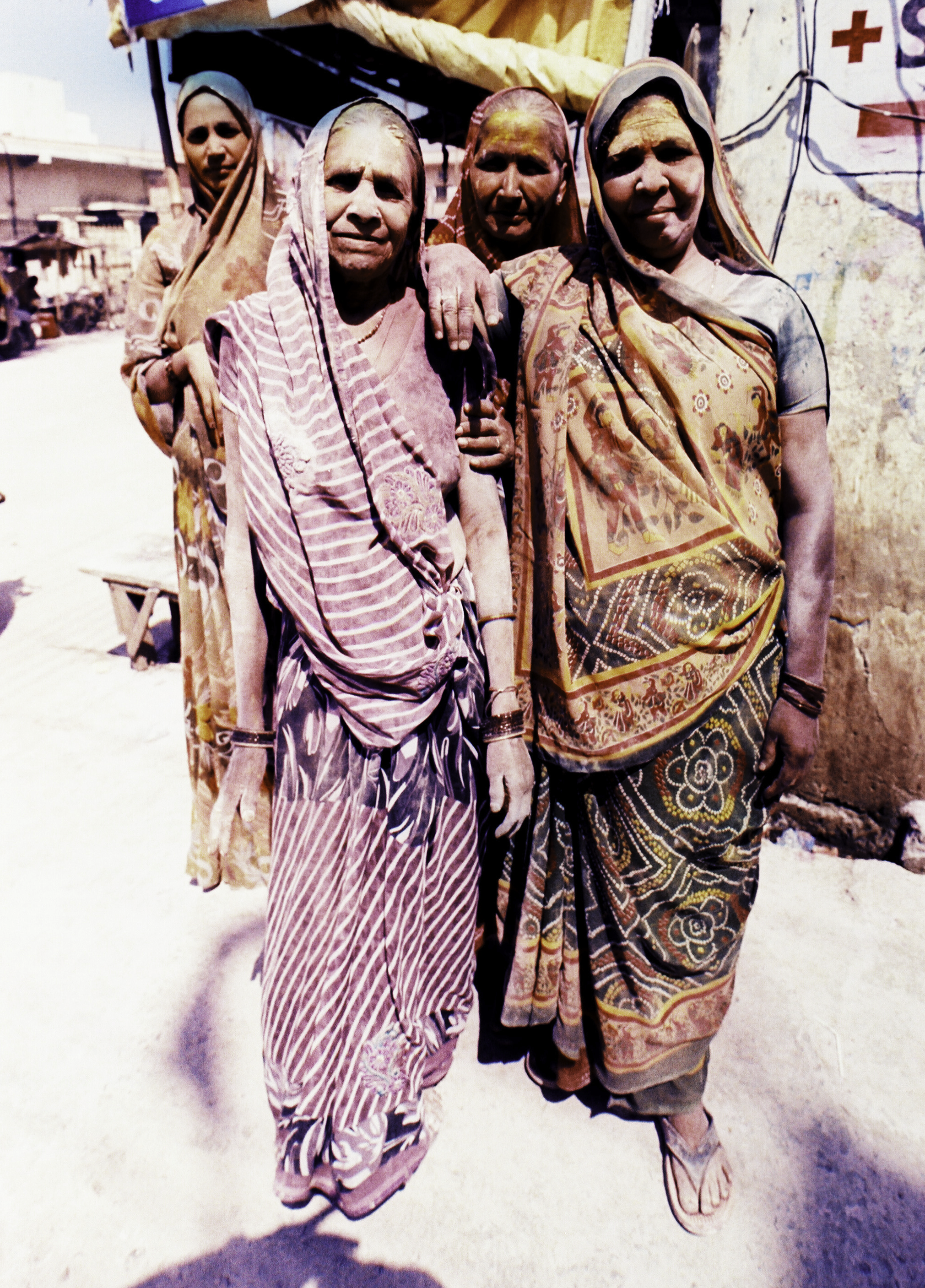 india woman standing in vrindavan.png