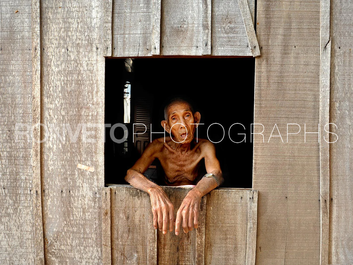 Man in window, Vietnam