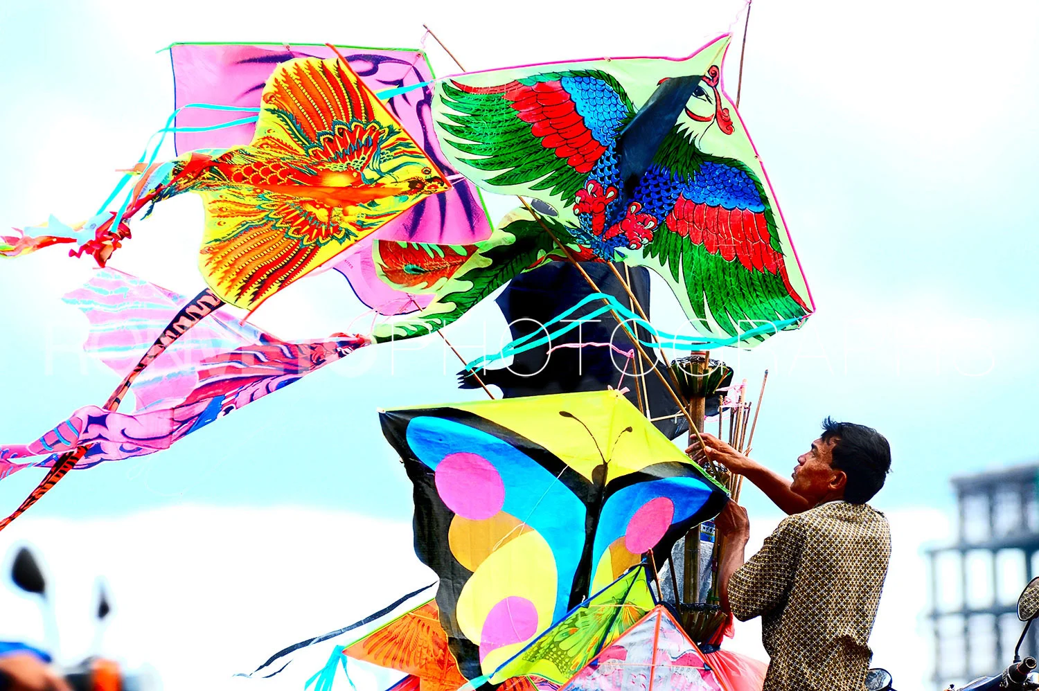 Kite salesman, Cambodia,