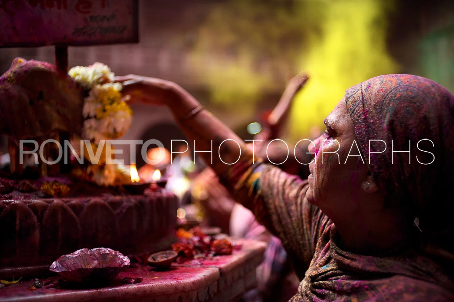 Woman at Temple during Holi, India