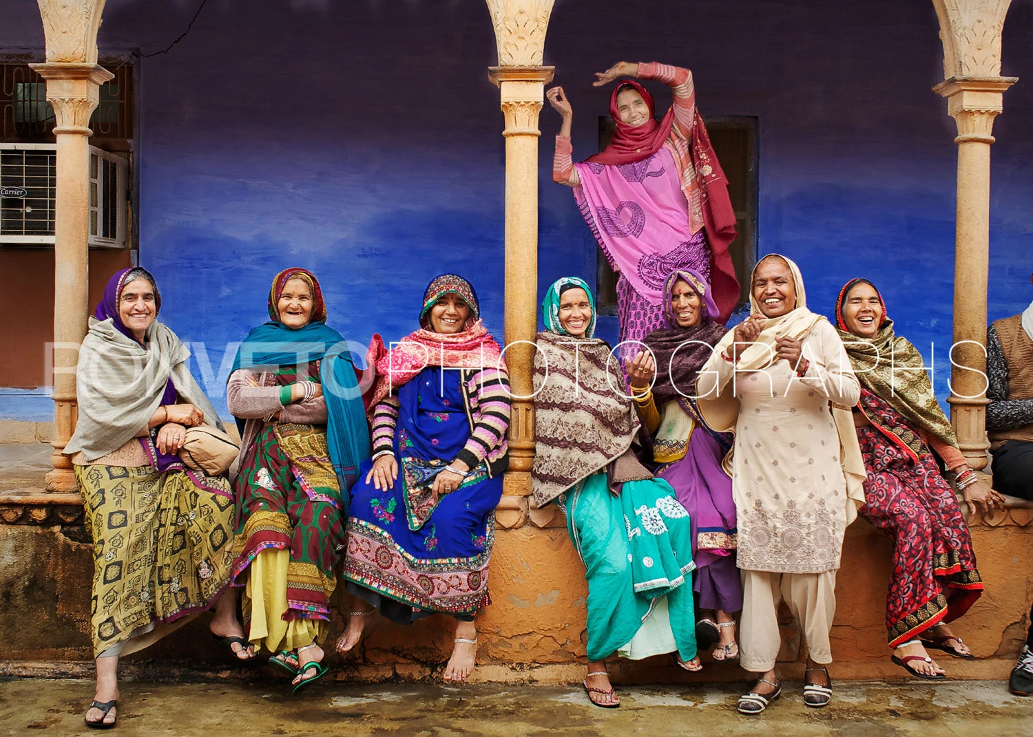 Holi woman laughing, Vrindavan, India
