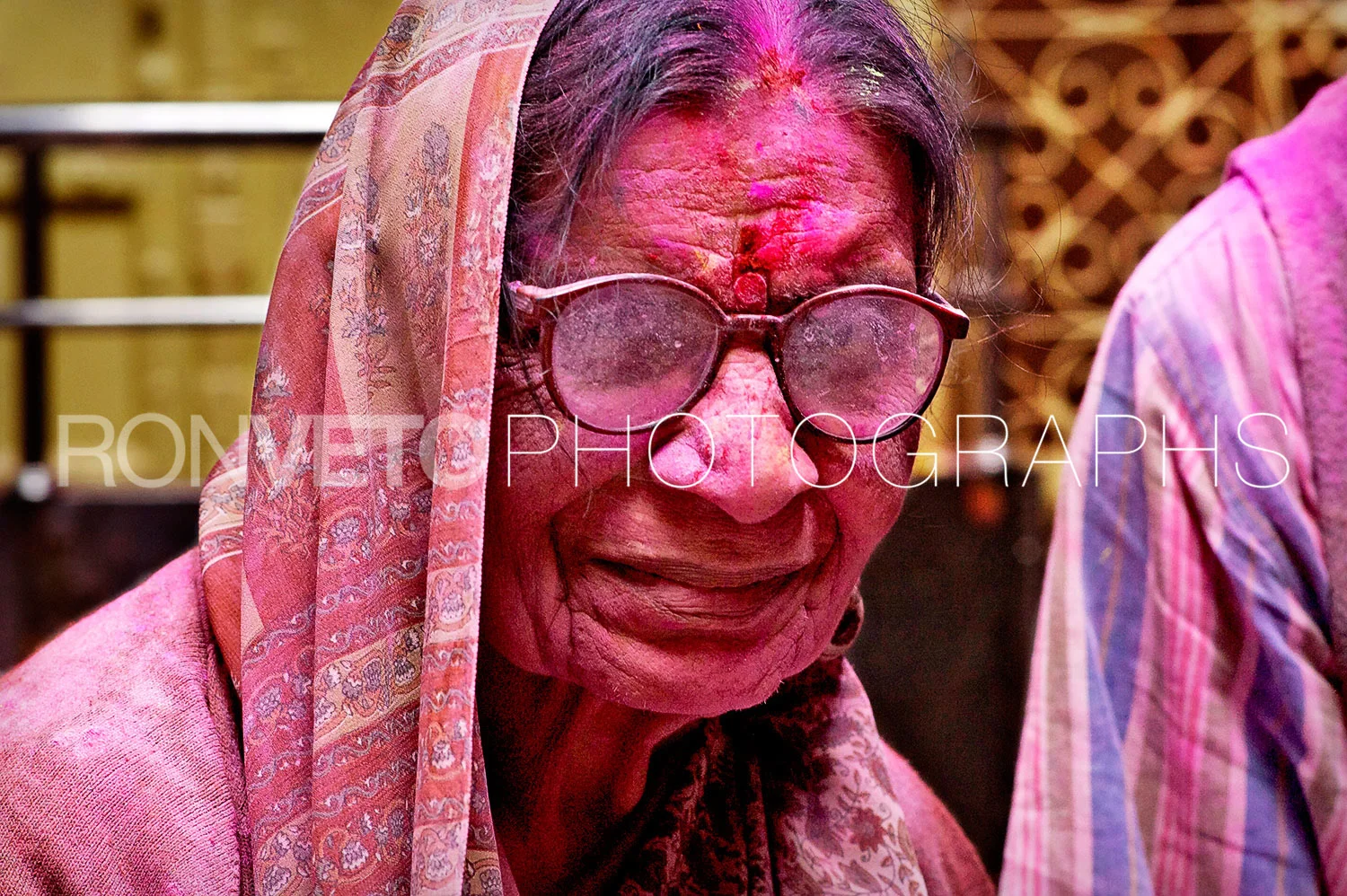 Old woman at Holi, India