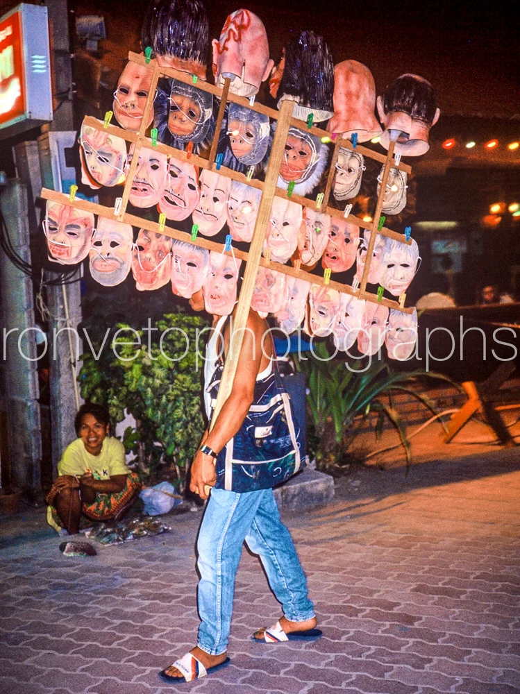 Faces for sale, Saigon, Vietnam