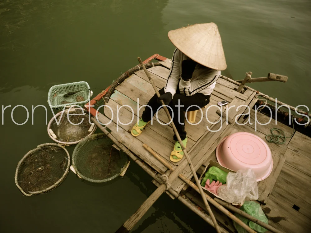 Ha-long Bay fishing woman, Ha-long Bay, Vietnam