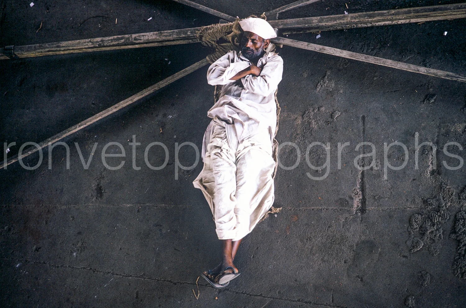 Relaxing in train station, Calcutta, India