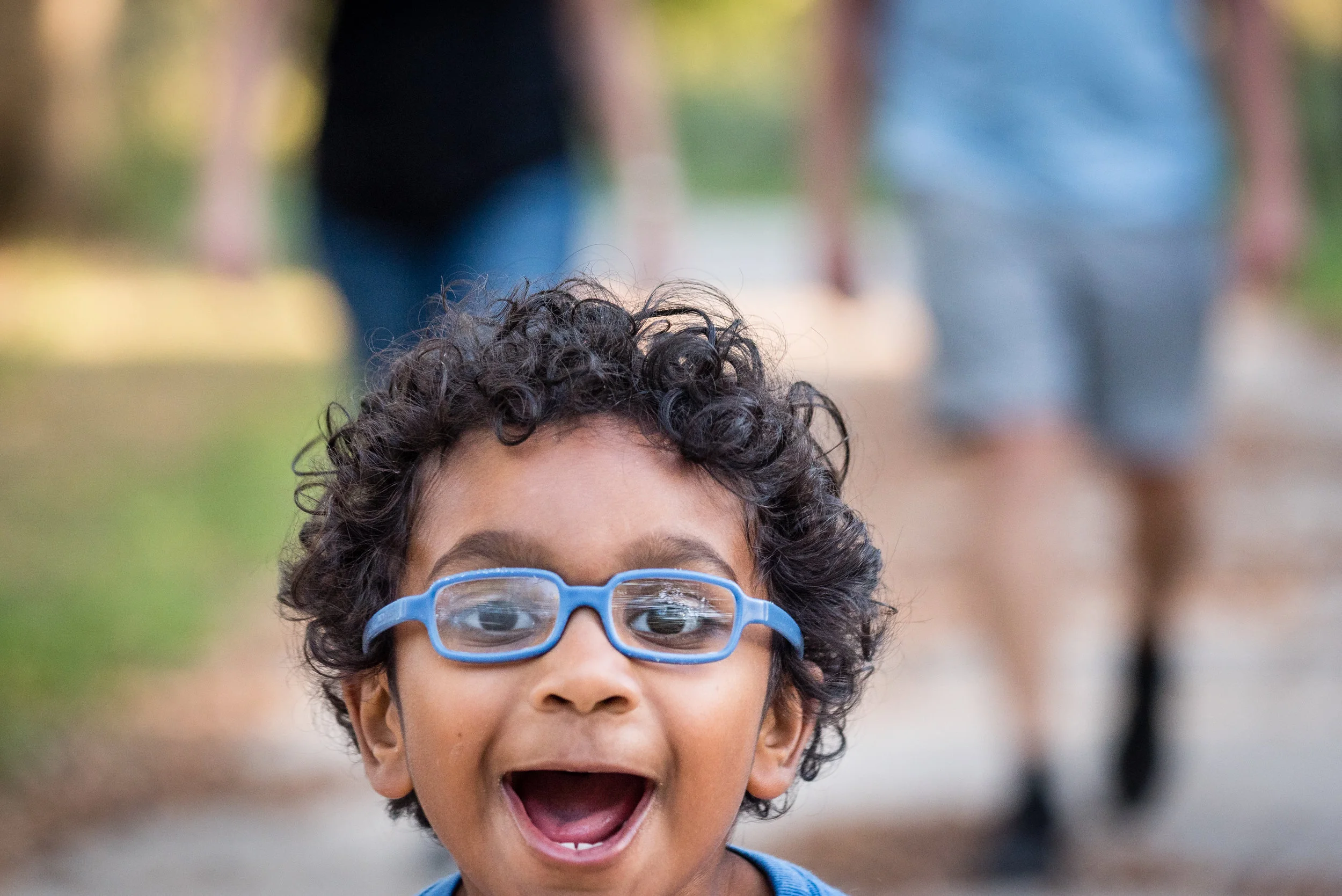 This picture was from a Grandparent Session. Trey and his grandparents went on a walk and I was out of sight around the bend in the path. When Trey turned the corner and saw me, he started running toward me as fast as he could. This picture captures the energy and enthusiasm of this little guy! I have this picture framed by my bedside. I want to be reminded to face each day with this kind of passion and joy!
