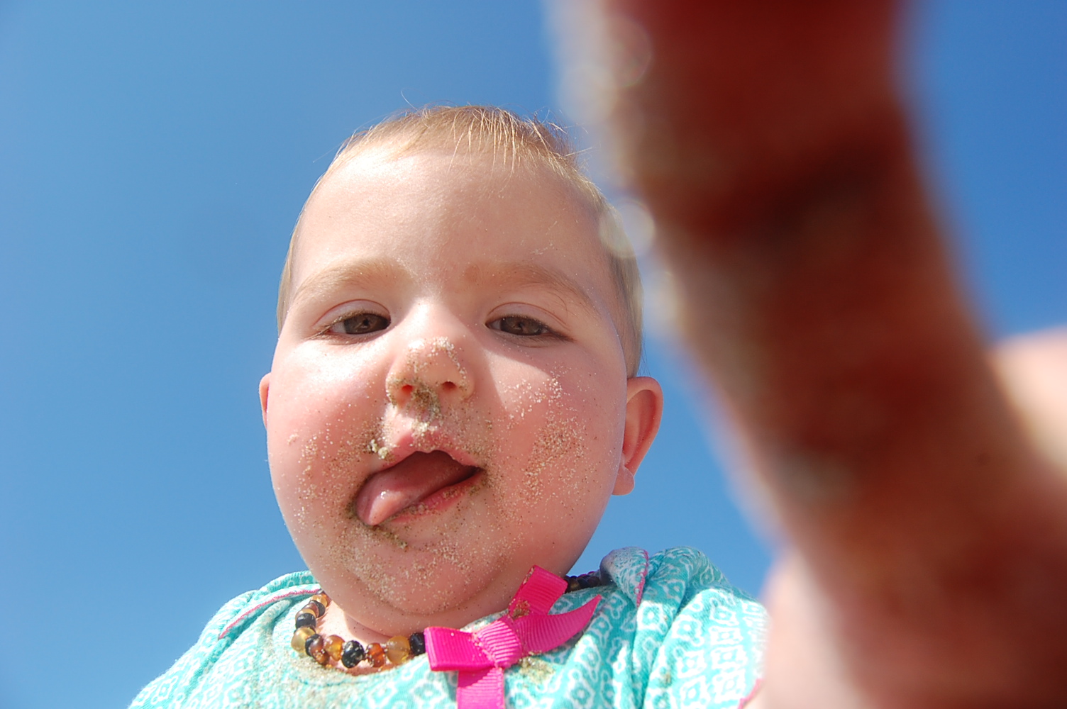 Sand, a face-licking good snack