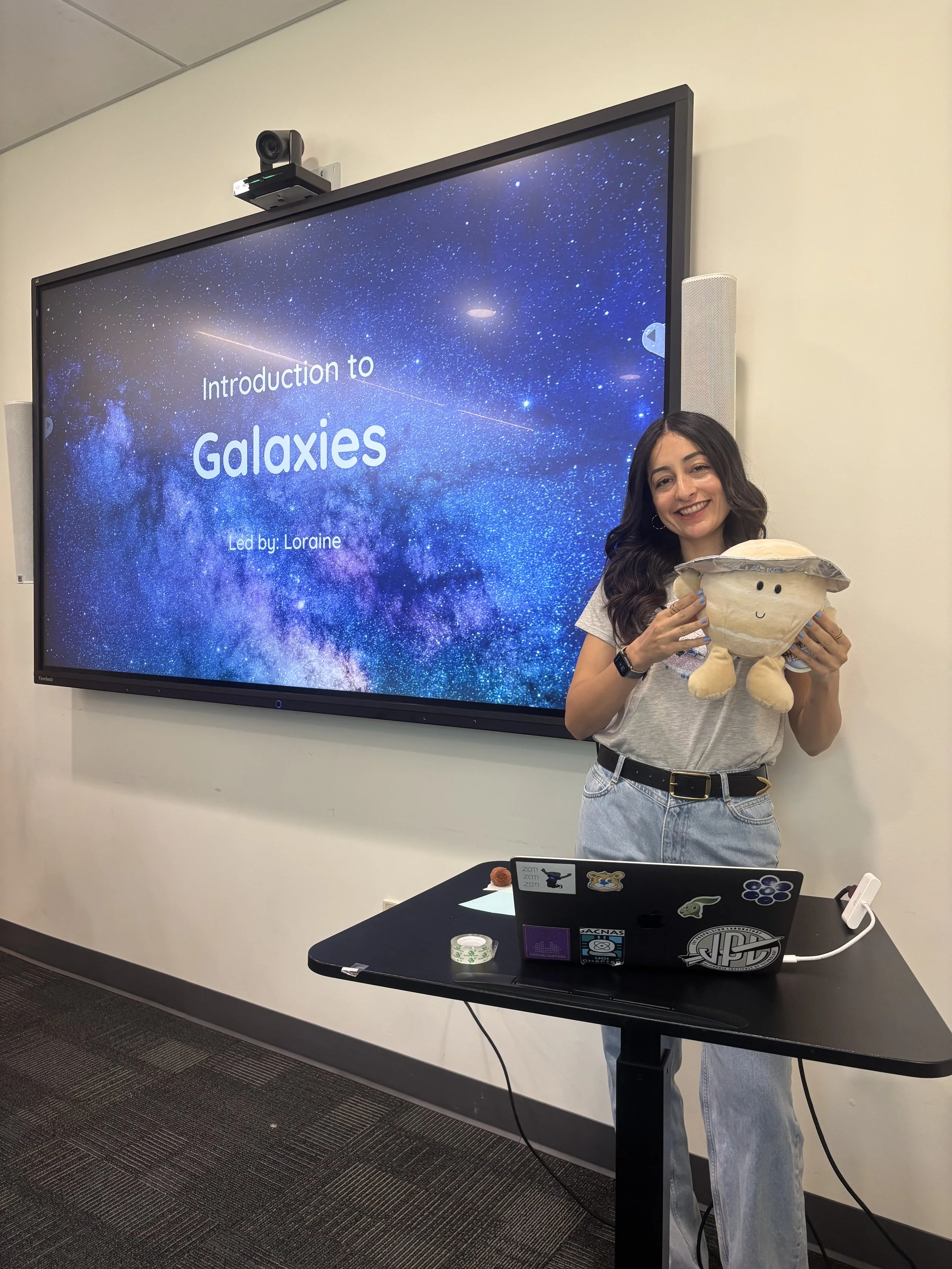 Learning about galaxies with Facilitator Loraine and Saturn buddy