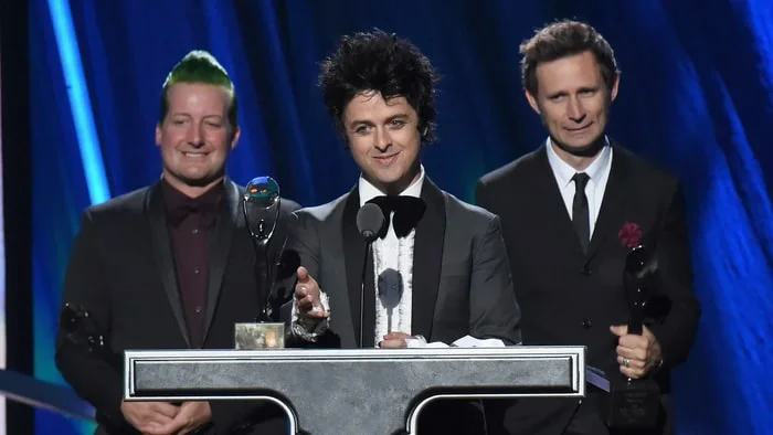 Punk-rock band Green Day was inducted in 2015. Are they pioneers or better thought of as preservationists of a tradition? (Photo source: www.rollingstone.com. Photo credit: Mike Coppola/Getty).