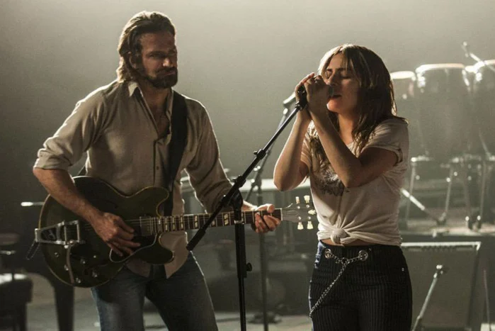 Bradley Cooper and Lady Gaga make music together in 2018’s remake of A Star is Born .