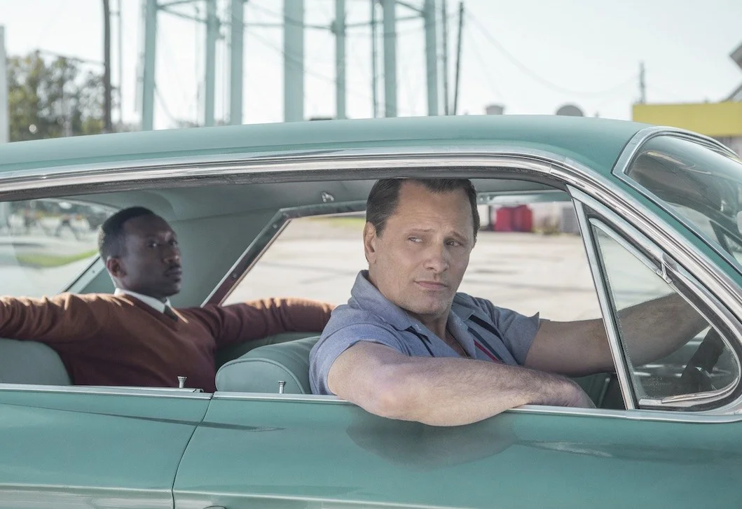 Dr. Shirley (portrayed by Mr. Ali) helps his chauffeur Tony Vallelonga (portrayed by Viggo Mortensen) grow in many ways. but we get few intimate glimpses of Dr. Shirley’s interior life.