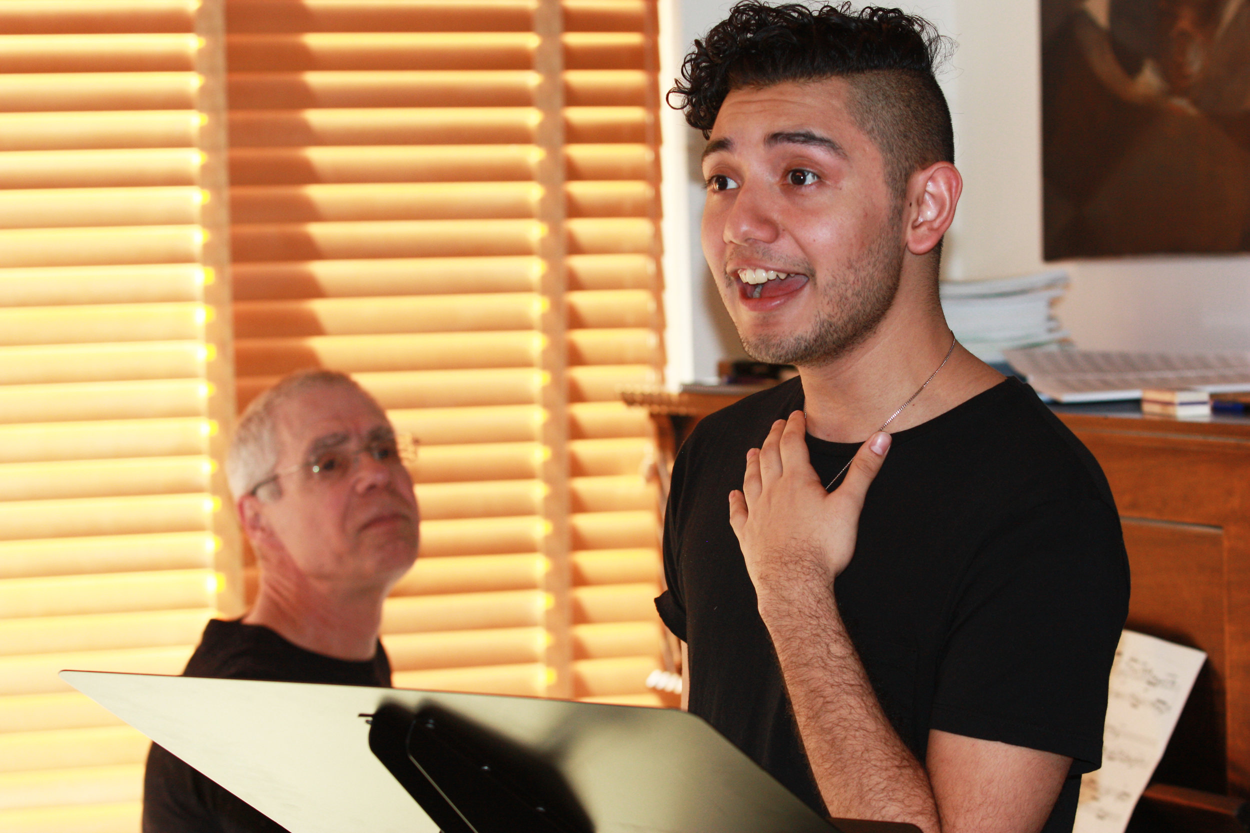 Rodolpho Giron, Singer (standing) & Joseph Waters, Composer (seated) - Right Click to Download (Photo Credit Christian Teare)
