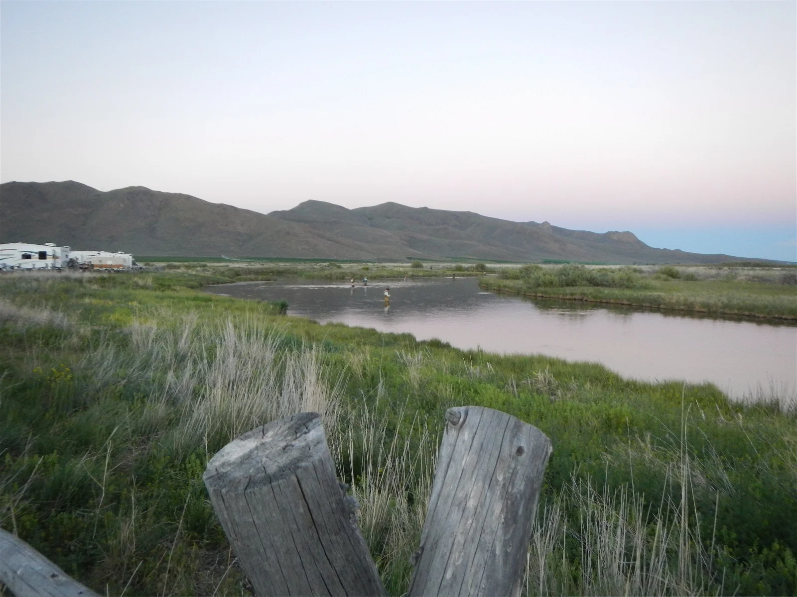 Anglers line the water as the day ends and the brown drake hatch begins at Point of Rocks.