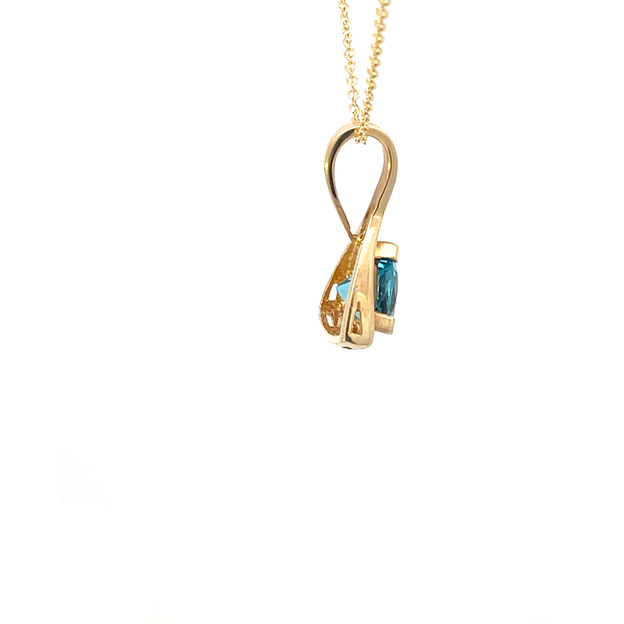 blue topaz triangle pendant.png