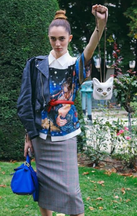Teddy Quinlivan in a Prada shirt / Loewe bag and necklace