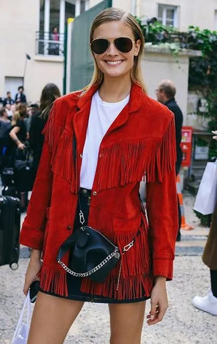 Constance Jablonski in an AG skirt and Loewe bag