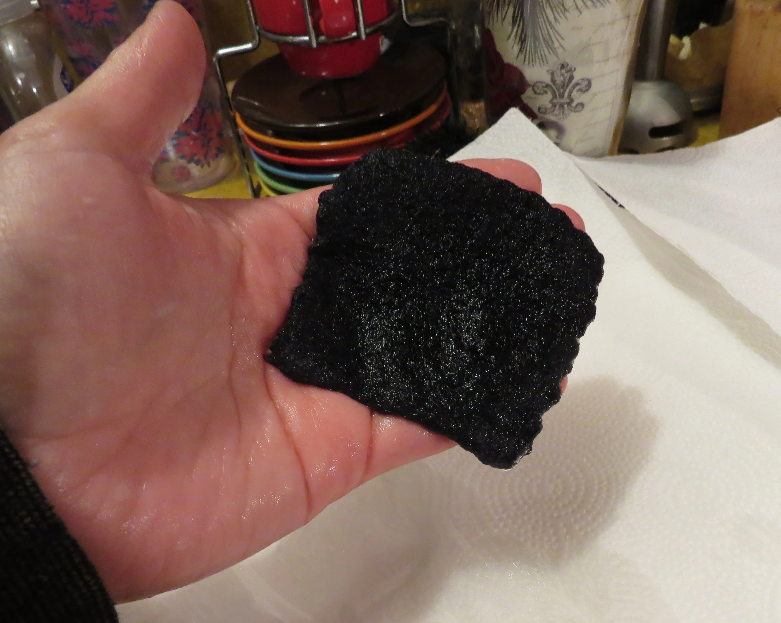 10. Turn the water to COLD, then rub the wool under it between your hands. This shocks the wool and locks it together. It feels like the wool is cringing in your hands! Expect rapid shrinkage.