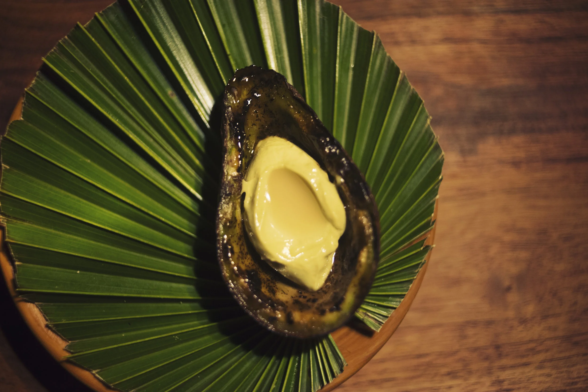 Dessert of grilled avocado and mamey seeds.jpg
