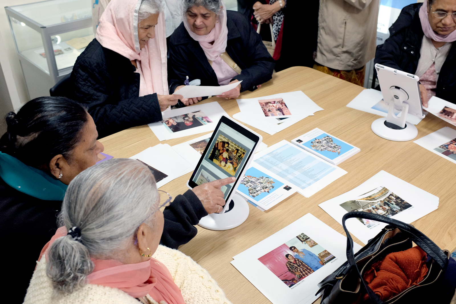 St Chad's Asian Ladies group learn to browse the archive physically and online.