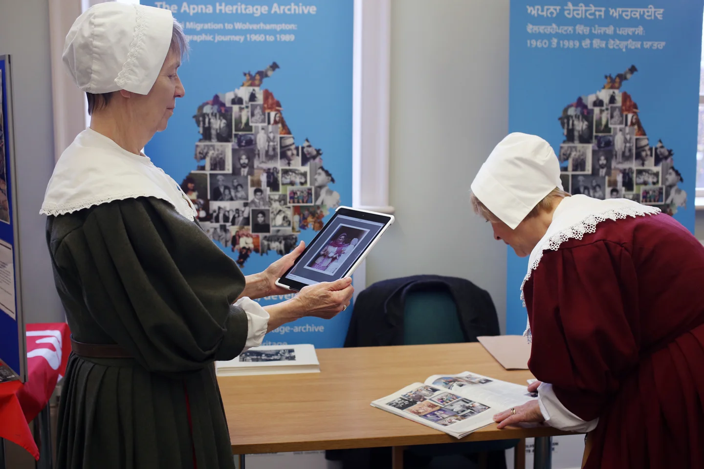 National Trust staff look at at our work online and articles written about the Apna Heritage Archive.