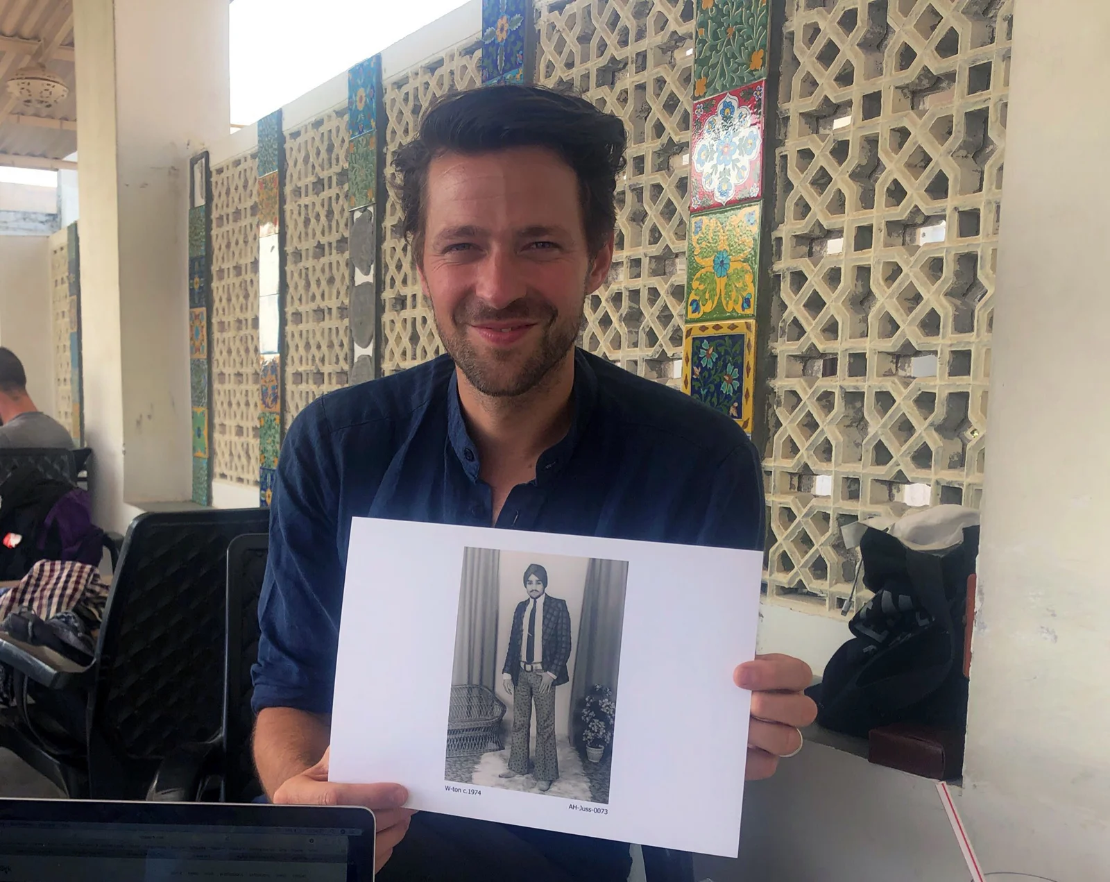 PUSHKAR - Lukas Birk picture here with a photograph from the Apna Heritage Archive. Working very ethically in South East Asia helping communities with photography projects and archive exhibitions. Very inspiriting time talking with his young man.