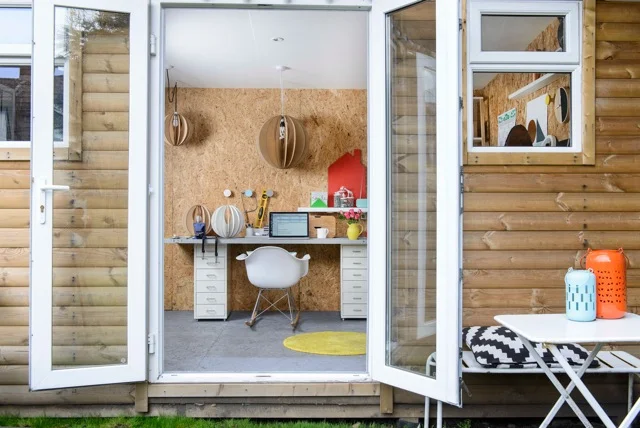 Double doors swing open and let in the fresh air and sunshine.