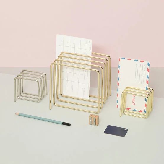 Brass-and-silver-magazine-and-letter-racks.jpg