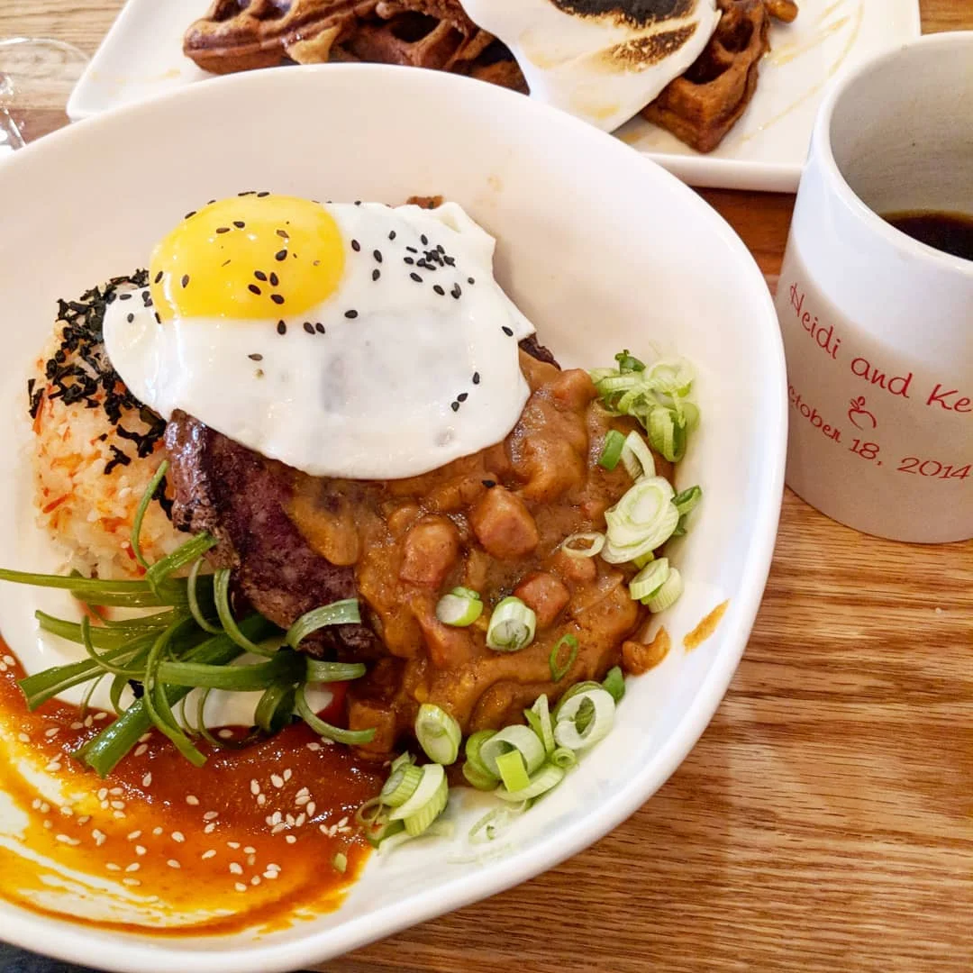 Loco Moco: Angus Beef Patty, Calrose Rice, Portuguese Sausage Gravy, Onion Marmalade and Sunny Egg. 