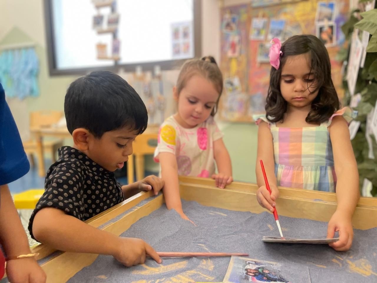 Family Picture Treasure Hunt - what fun way to find our pictures! Seeing their pictures in the classroom not only fosters a sense of belonging among the children but also initiates conversations either among the children themselves or with adults.⁠
⁠