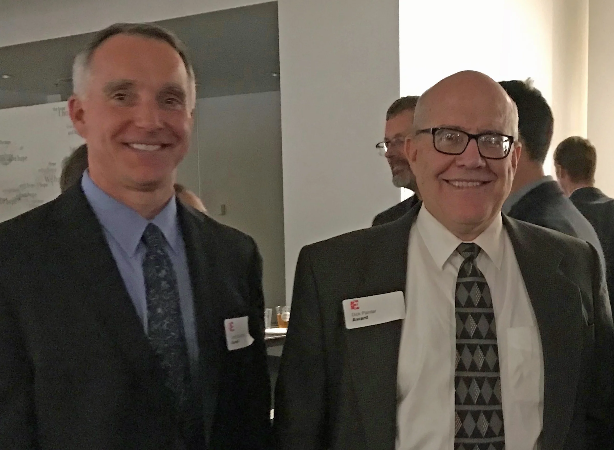 BTL Architect principal Delph Gustitus (pictured left) with Northwestern University's Manager of Construction Projects, Dick Painter (pictured right) at Design Evanston's 2017 Awards Ceremony, November 2, 2017.