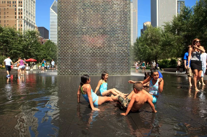 Visitors enjoying the Crown Fountain in Millennium Park in downtown Chicago. (Photo: fotoluminate)