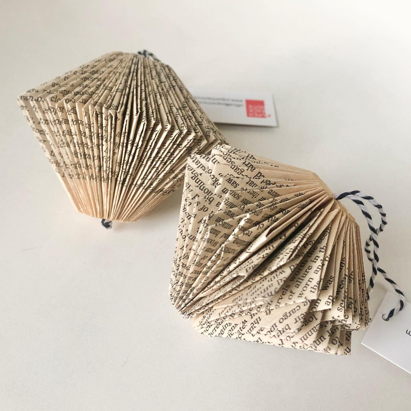 Thank you for support at the @toquecraftfair virtual market! We&rsquo;re prepping items sold after our first day. We still have a few more hanging book art ornaments available.

Our paper ornaments are made from one thickness of an old book. Each pag