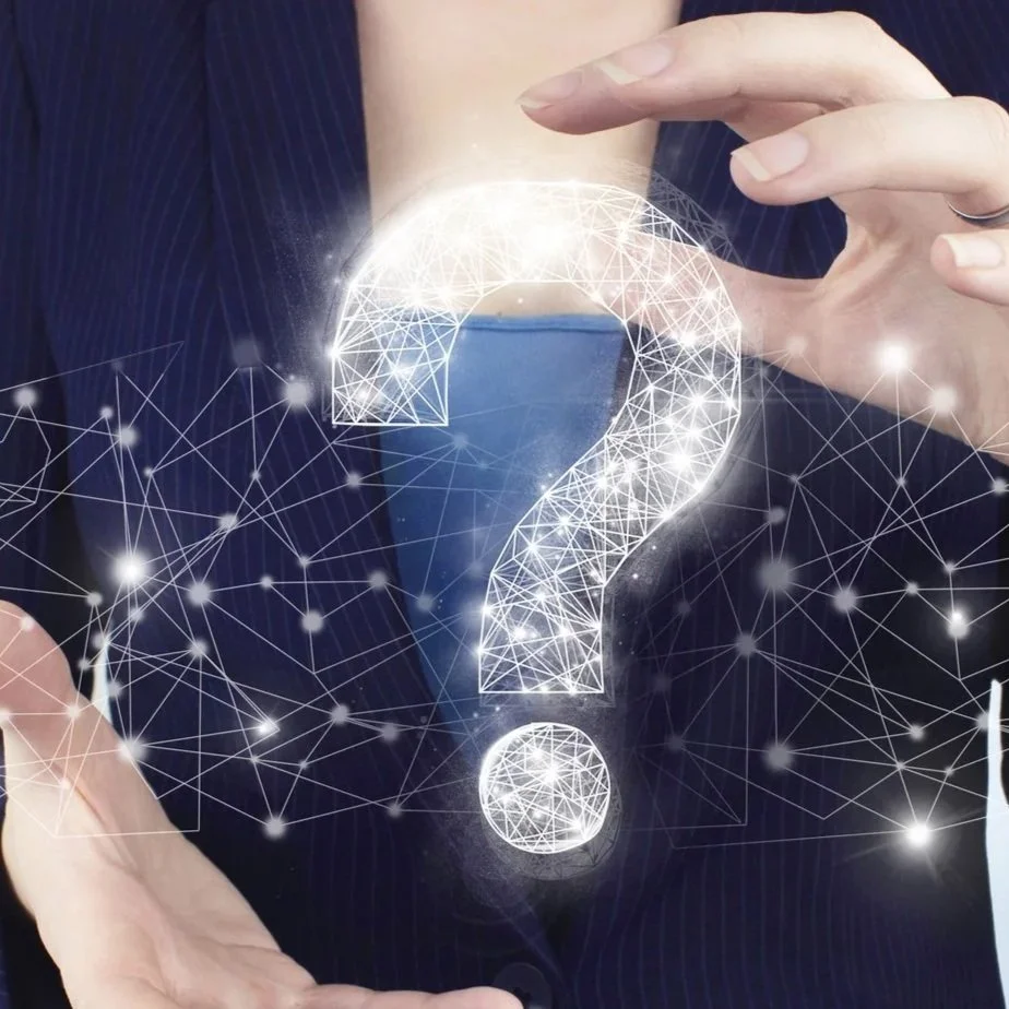 faq-frequently-asked-questions-concept-two-hand-holding-virtual-holographic-question-mark-icon-with-light-blurred-background-business-support-concept-problems-solutions.jpg