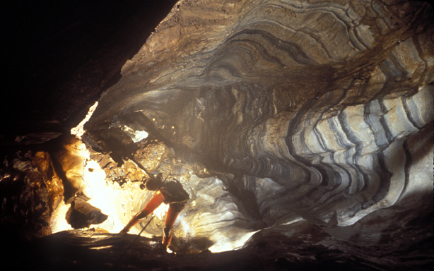   Bill Stone rappelling "the 318" in the original route of the Sotano de San Agustin section of Sistema Huautla.  