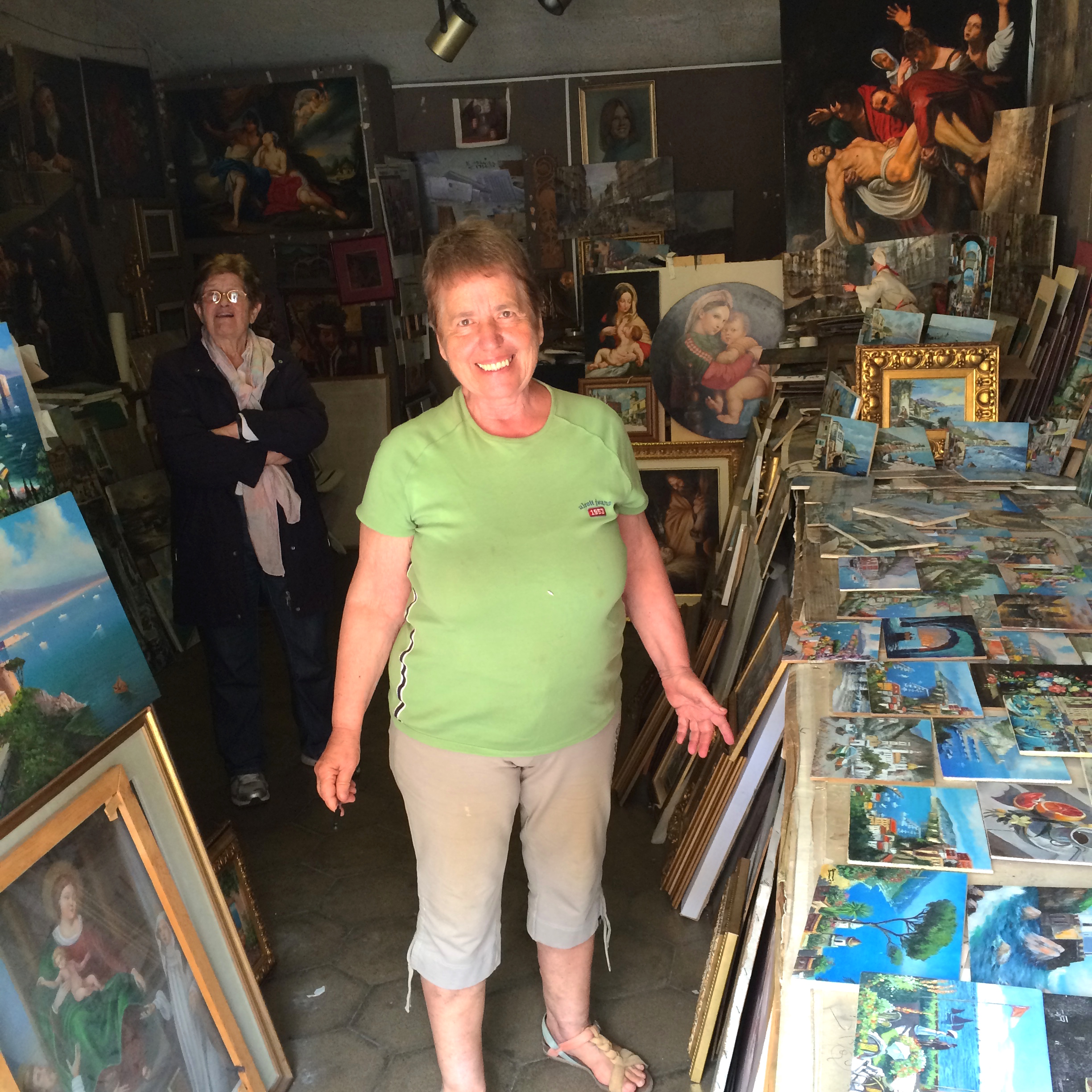 The beaming artist herself, in her studio. That may or may not be her mother in the background. 