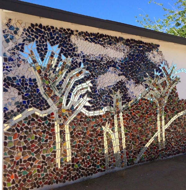 Colleena's creating this mosaic masterpiece on the exterior wall of the recording studio, which looks onto the backside of the main house. 