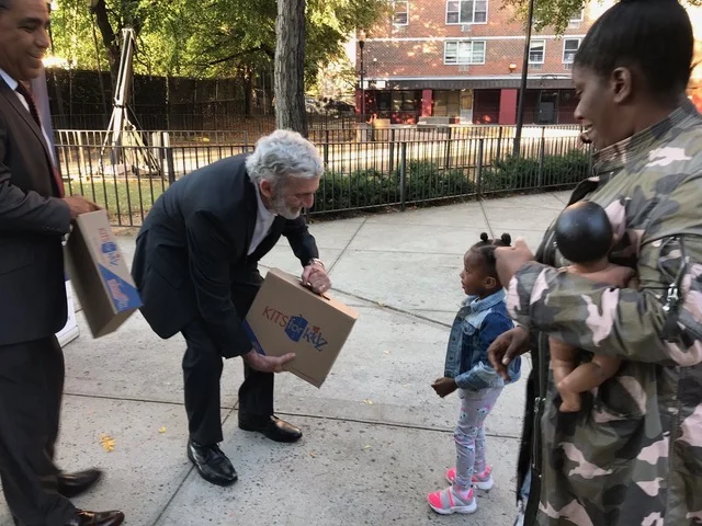 Sometimes the supply kits were heavier than the kids.