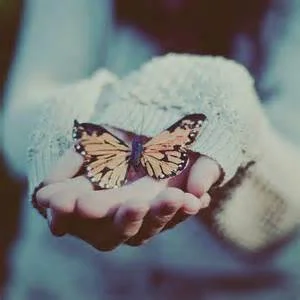 Vintage hand buterfly.jpg