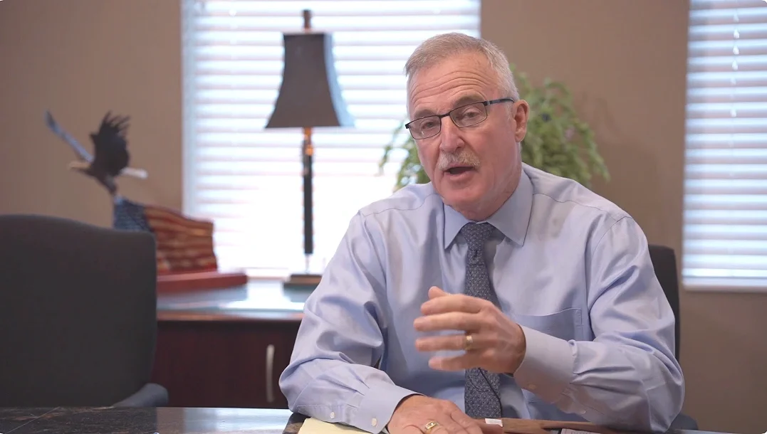 Indianapolis Corporate Videography showing image of a video of a business owner describing his business