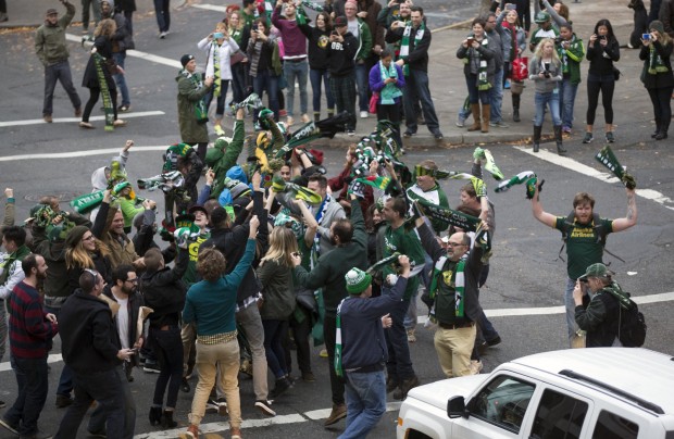 Timbers fans celebrate despite the knowledge of only being a great team in a horrible league. Photo Credit: The Oregonian