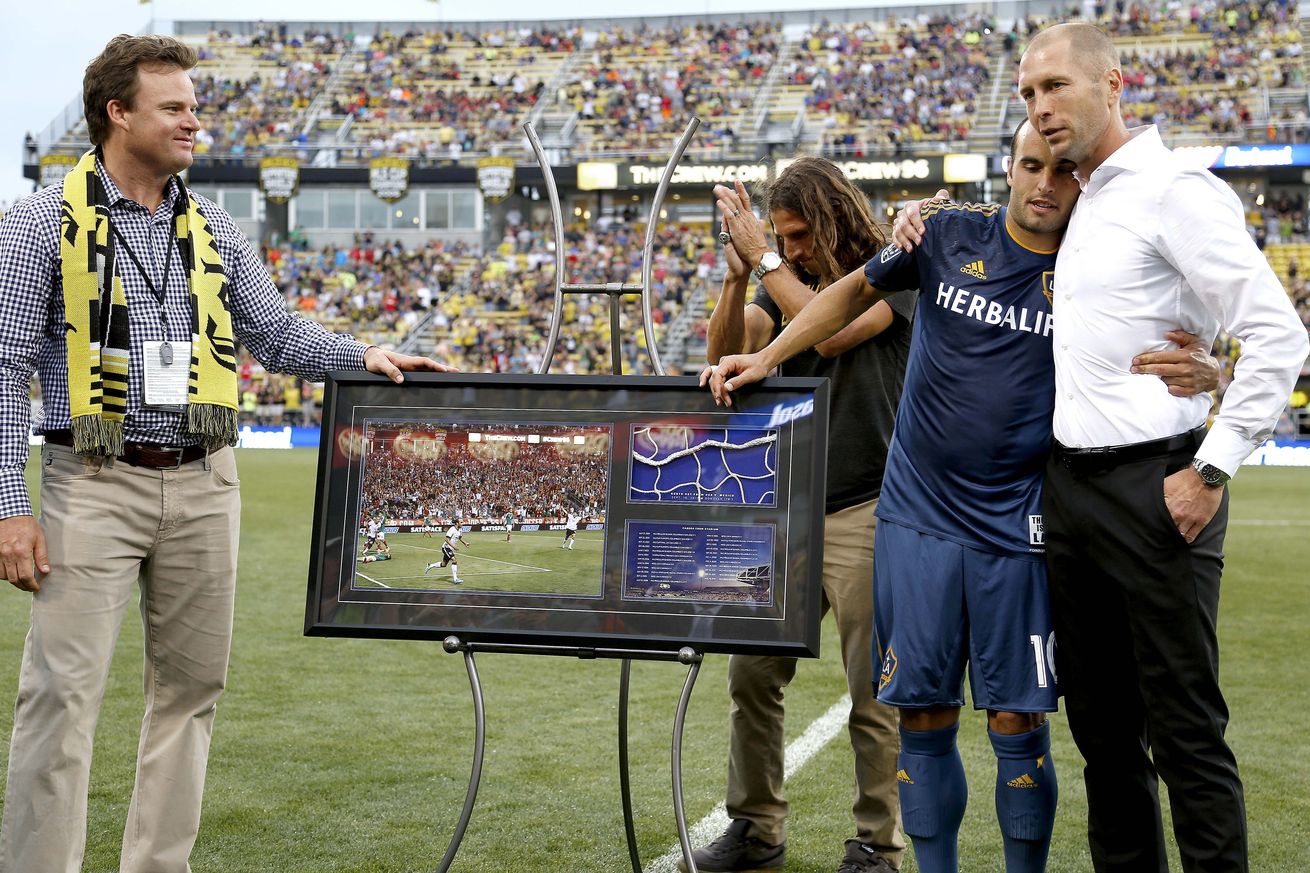 Another framed picture? What happened to that Keurig Carafe that I registered for, Gregg?