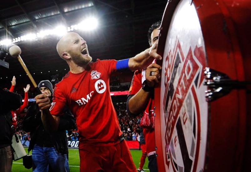 "I don't want to work... I just want to bang on the drum all day..... and not file this freaking paperwork.. is it Tuesday yet? WHY IS IT TAKING FOREVER FOR TUESDAY!" THE CANADIAN PRESS/Mark Blinch