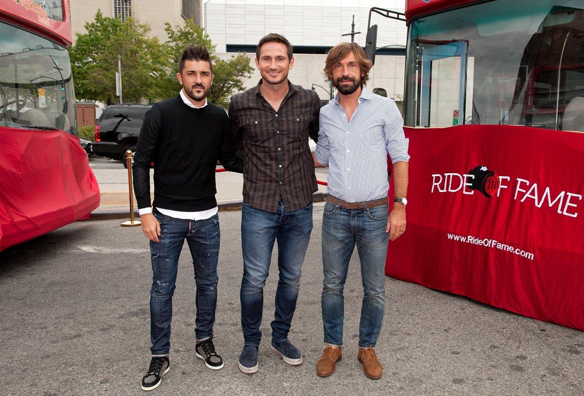 Area man inducts NYCFC Designated Players David Villa (l.) and Andrea Pirlo (r.) into the Ride of Fame Tuesday (D DIPASUPIL/GETTY IMAGES FOR RIDE OF FAME)