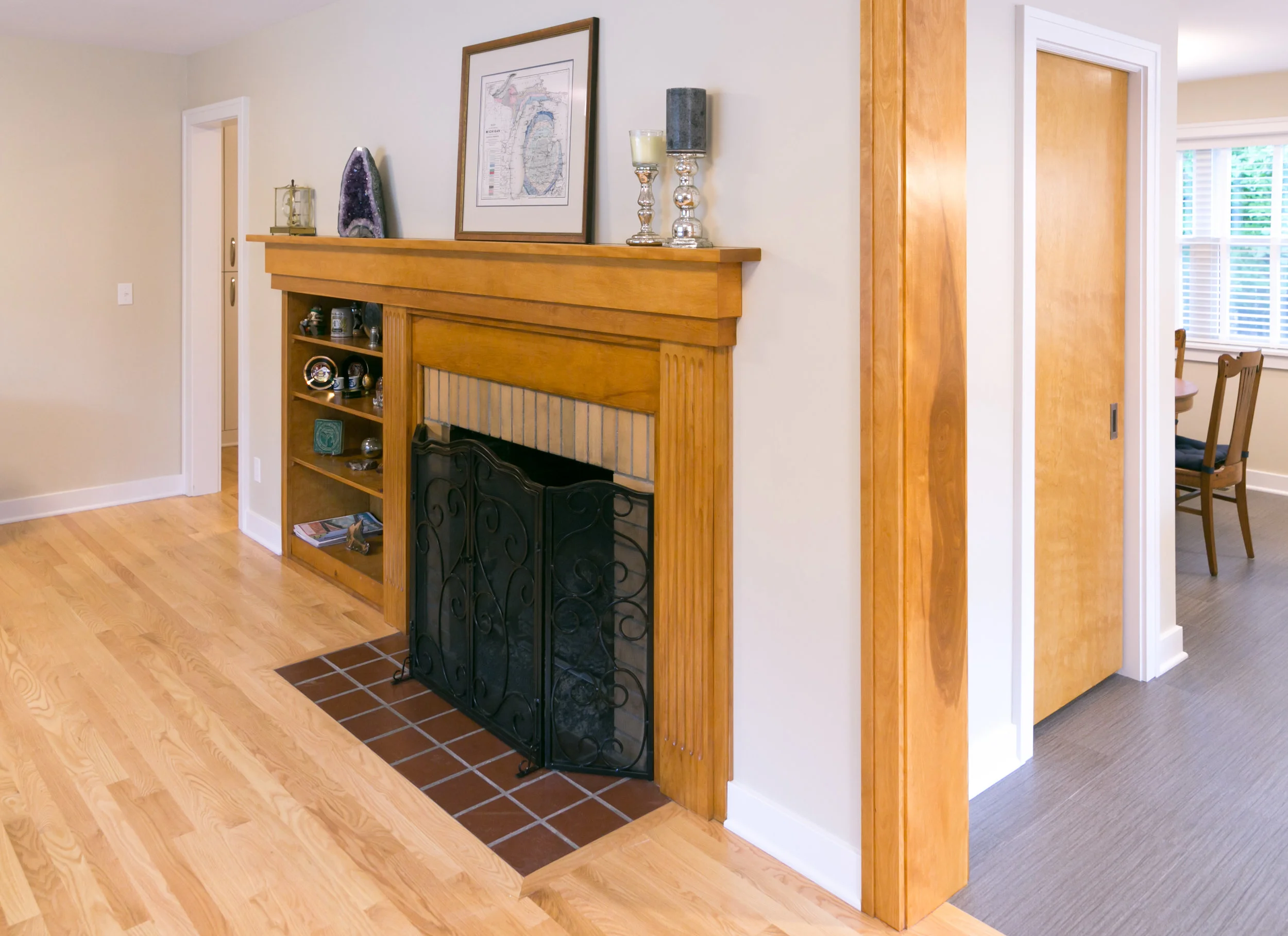 AFTER: By removing one of the two built-in shelves, the circulation of traffic flow improved, as did the amount of natural light streaming to the room.