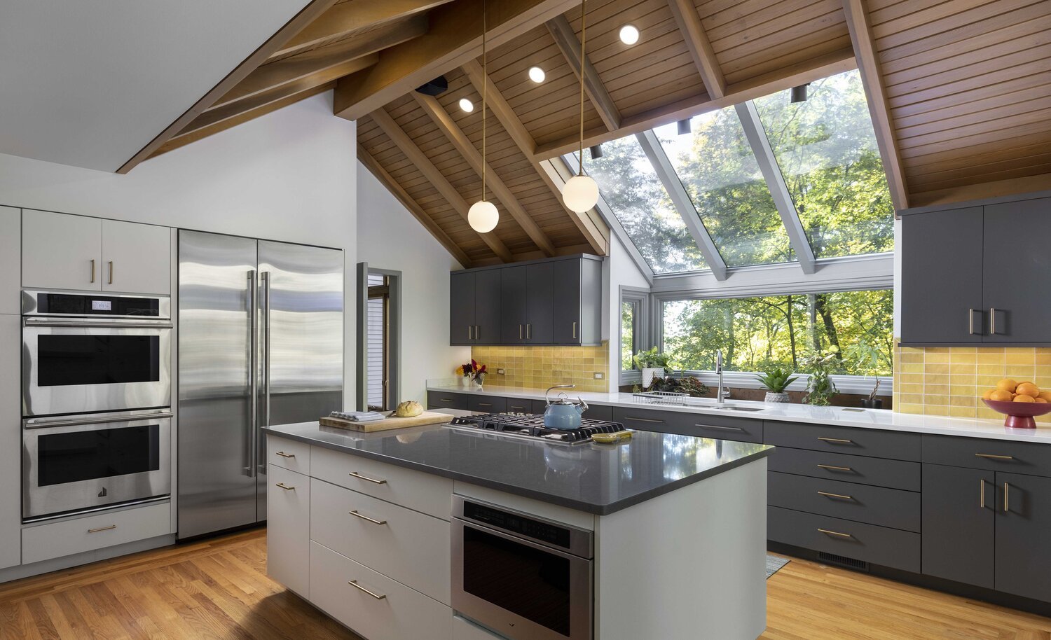 large kitchen island in a kitchen remodel in Ann Arbor, MI by Forward Design Build Remodel