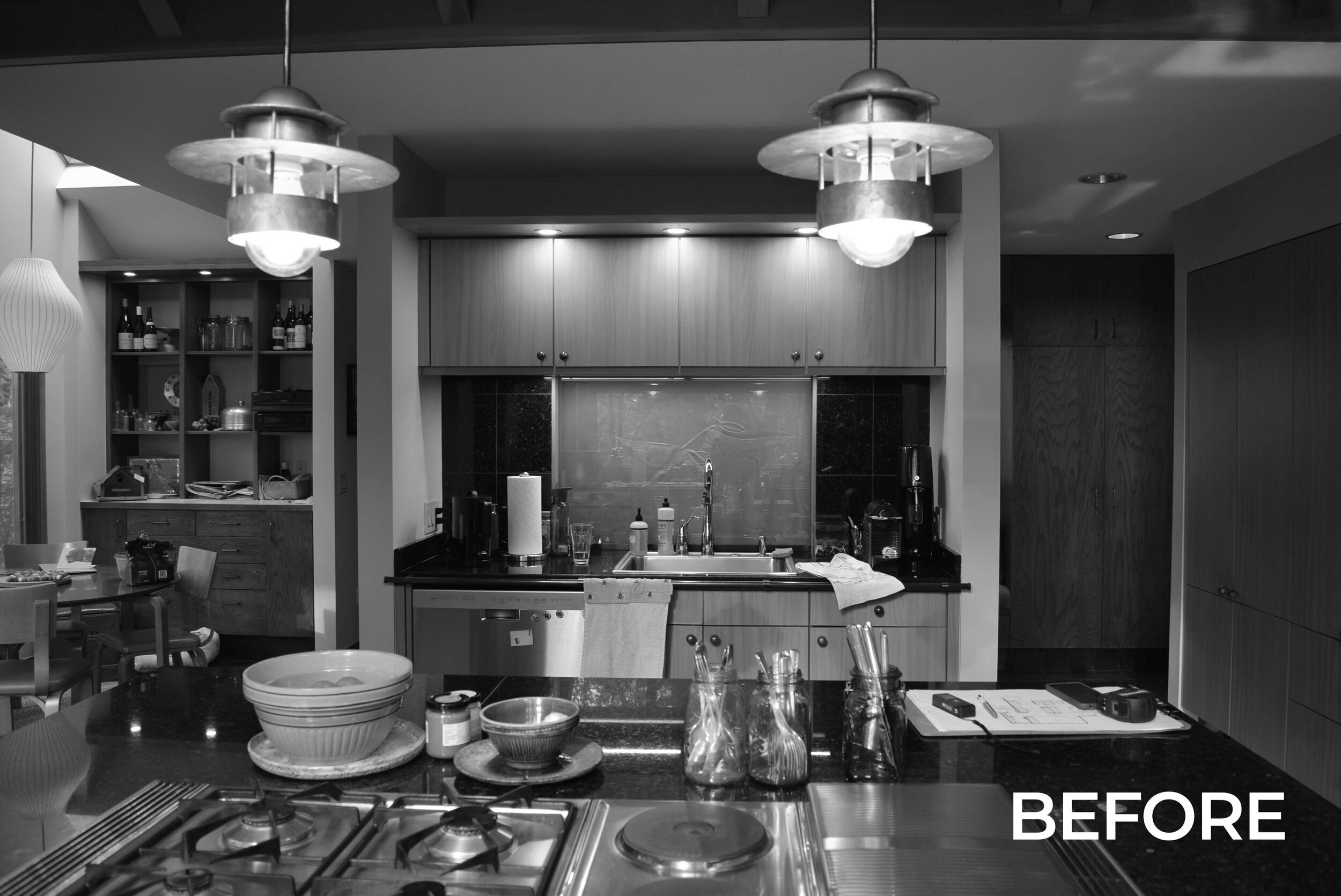 picture of before a kitchen remodel in black and white in Ann Arbor, MI by Forward Design Build Remodel