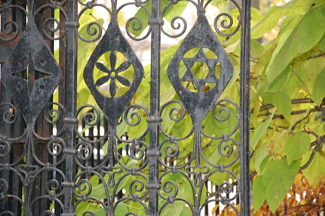 Be sure to examine the exquisite iron fence surrounding the garden. 