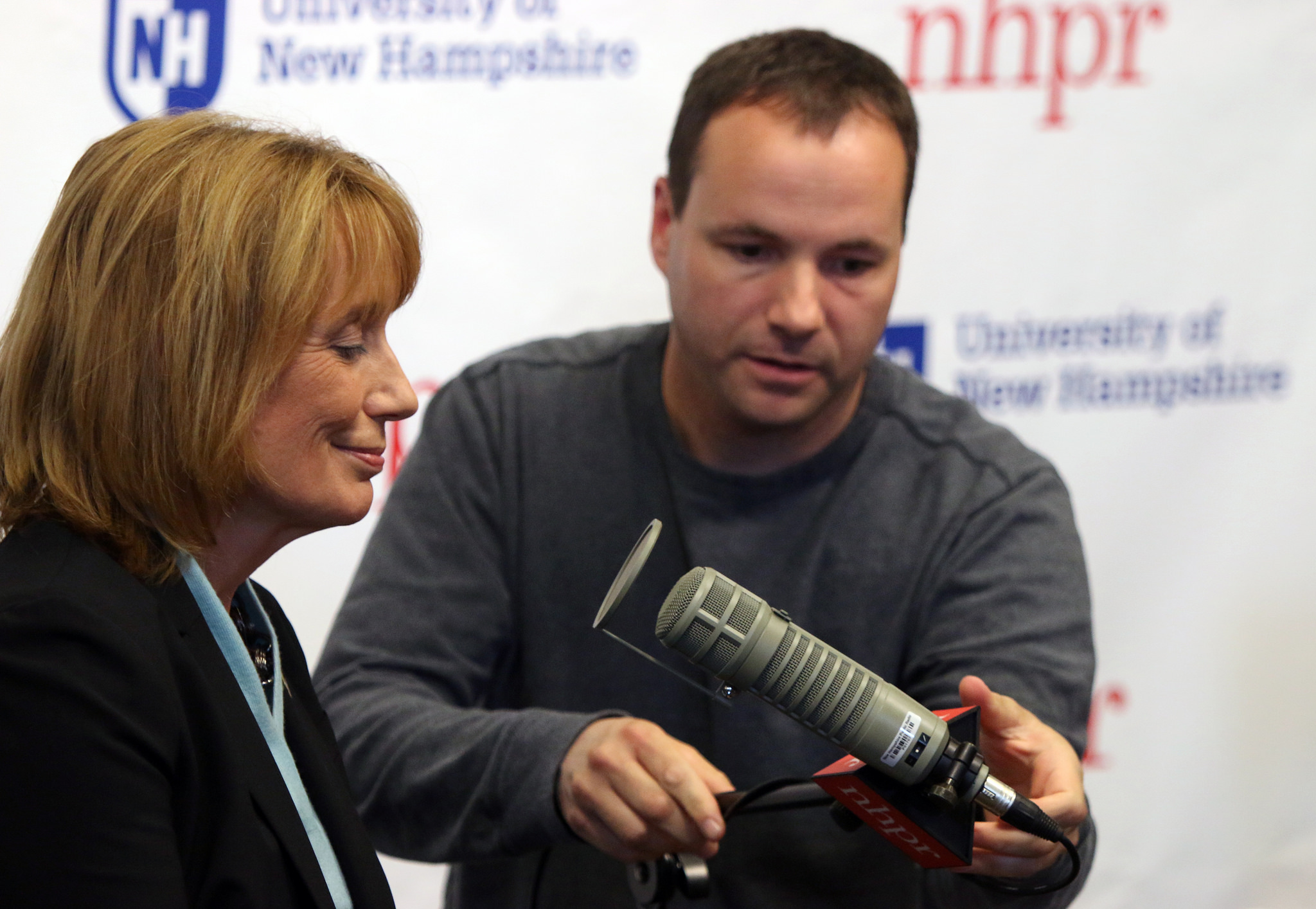 Governor Maggie Hassan gets a sound check before a live conversation with Laura Knoy at the Rudman Center, 2014
