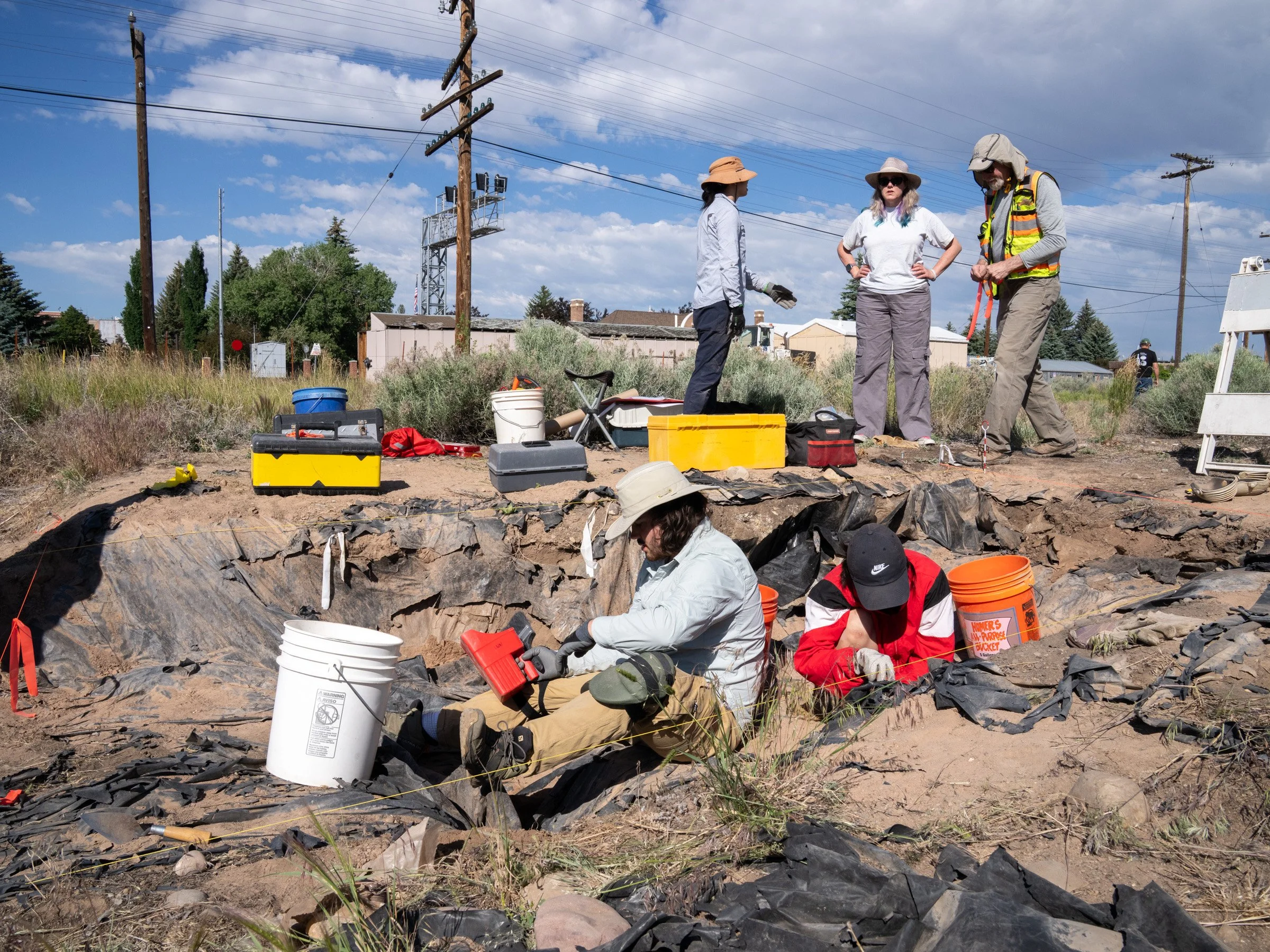 The archaeologist crew works at the Evanston Chinatown excavation site in June 2024.